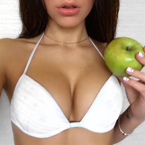 Galina Dubenenko in a bikini taking a selfie