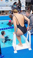 Adrienne Bailon – Swim for Relief Benefit, NY 10/9/13  