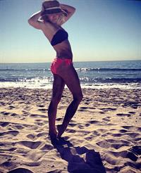 Emily Osment in a bikini
