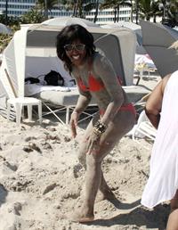 Alexandra Burke bikini candids Miami March 7, 2011 