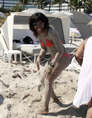 Alexandra Burke bikini candids Miami March 7, 2011 