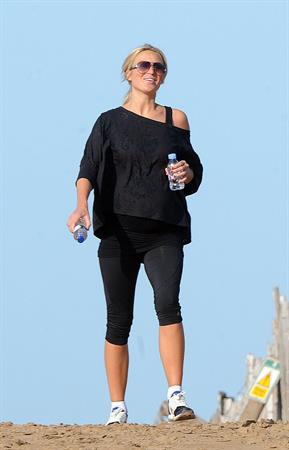 Alex Curran - Personal training session on a beach on September 19, 2011
