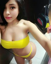 Alejandra Gil in a bikini taking a selfie