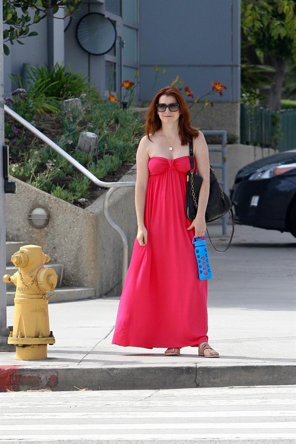 Alyson Hannigan in a red dress in Santa Monica on August 20, 2012