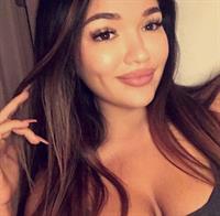 Miss Genii taking a selfie