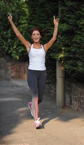 Amy Childs out jogging in Essex on August 1, 2011