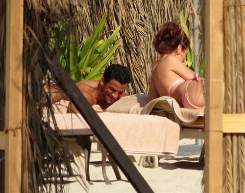 Amy Childs sunbathing with Peter Andre in Dubai on January 3, 2012