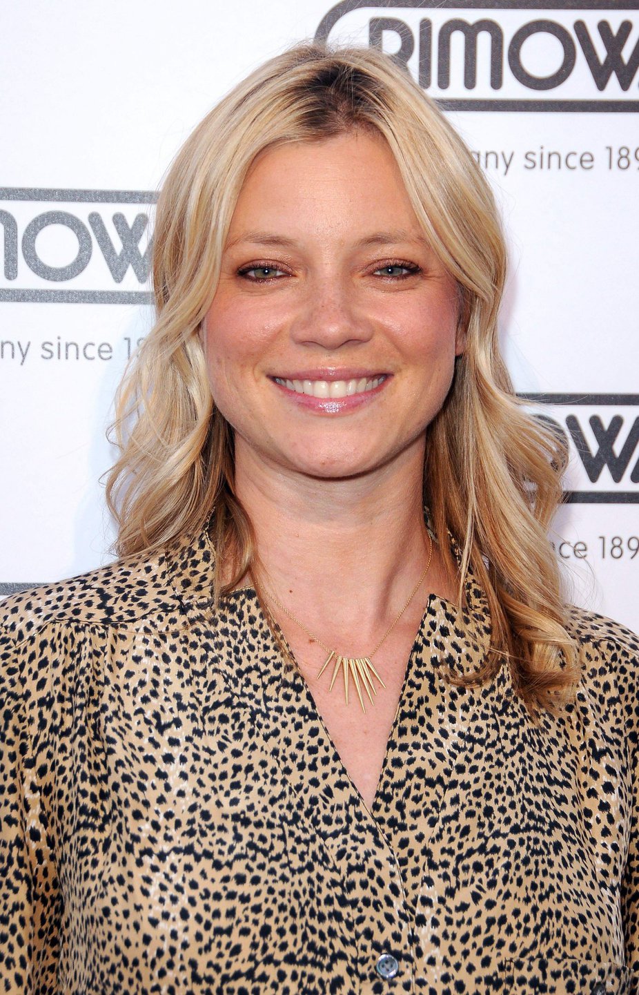 Amy Smart Rimowa New Rodeo Drive store opening party in Beverly Hills on May 16, 2011