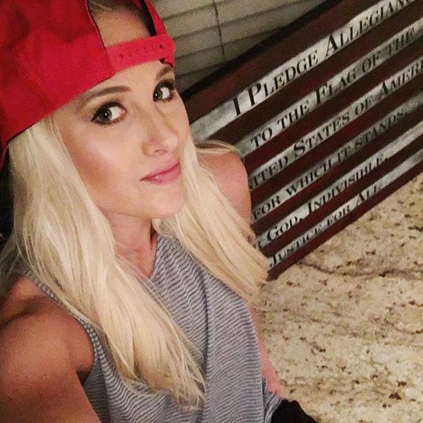 Tomi Lahren taking a selfie