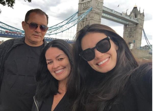 Anne De Paula with her parents