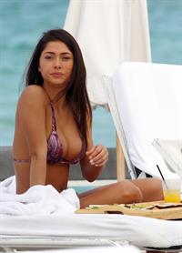 Arianny Celeste bikini candids on a beach in Miami on February 16, 2012