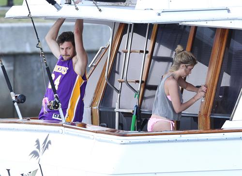 Ashley Benson bikini on a boat in Florida March 11, 2012 