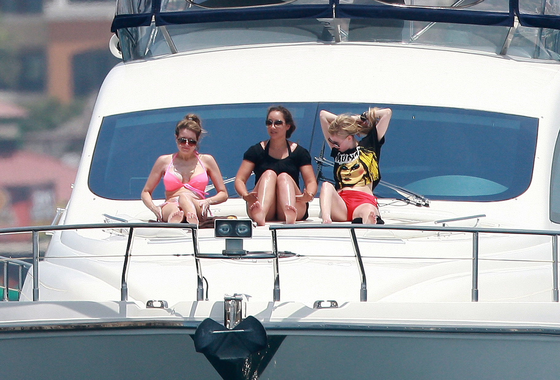 Avril Lavigne in a green bikini in Cabo, Mexico on July 27, 2012