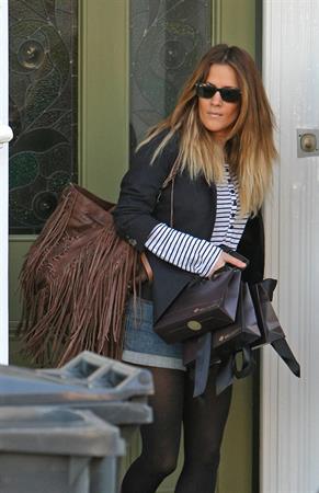 Caroline Flack leaving her London home on December 9, 2011