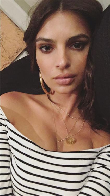 Emily Ratajkowski taking a selfie