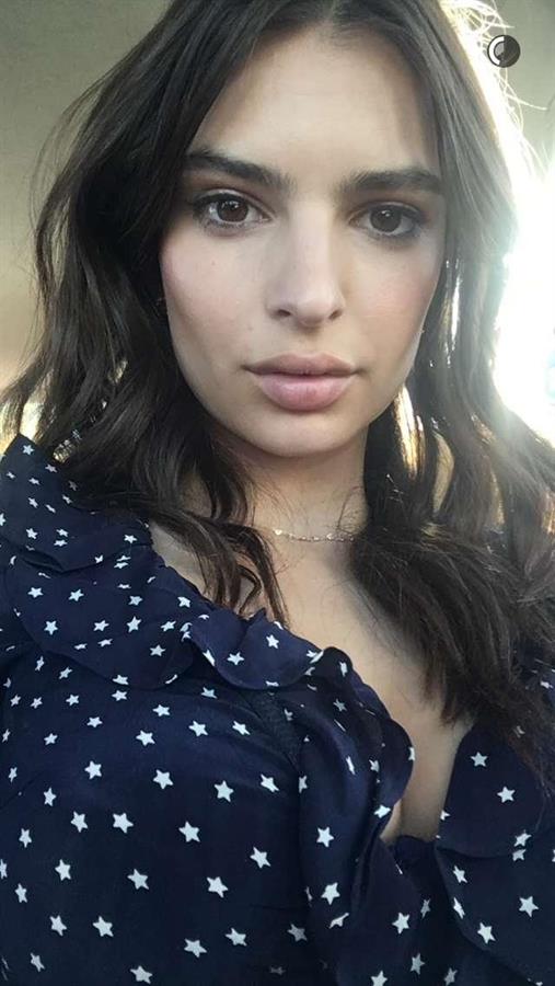 Emily Ratajkowski taking a selfie