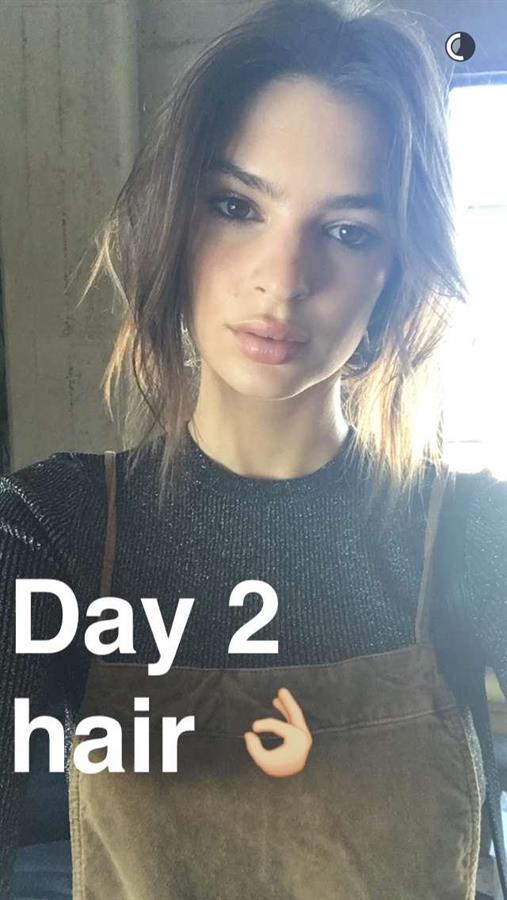 Emily Ratajkowski taking a selfie