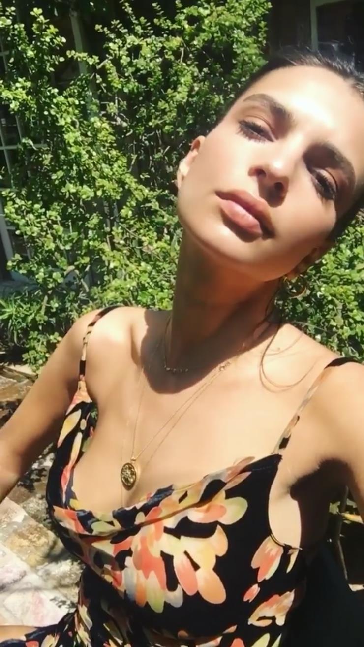 Emily Ratajkowski taking a selfie