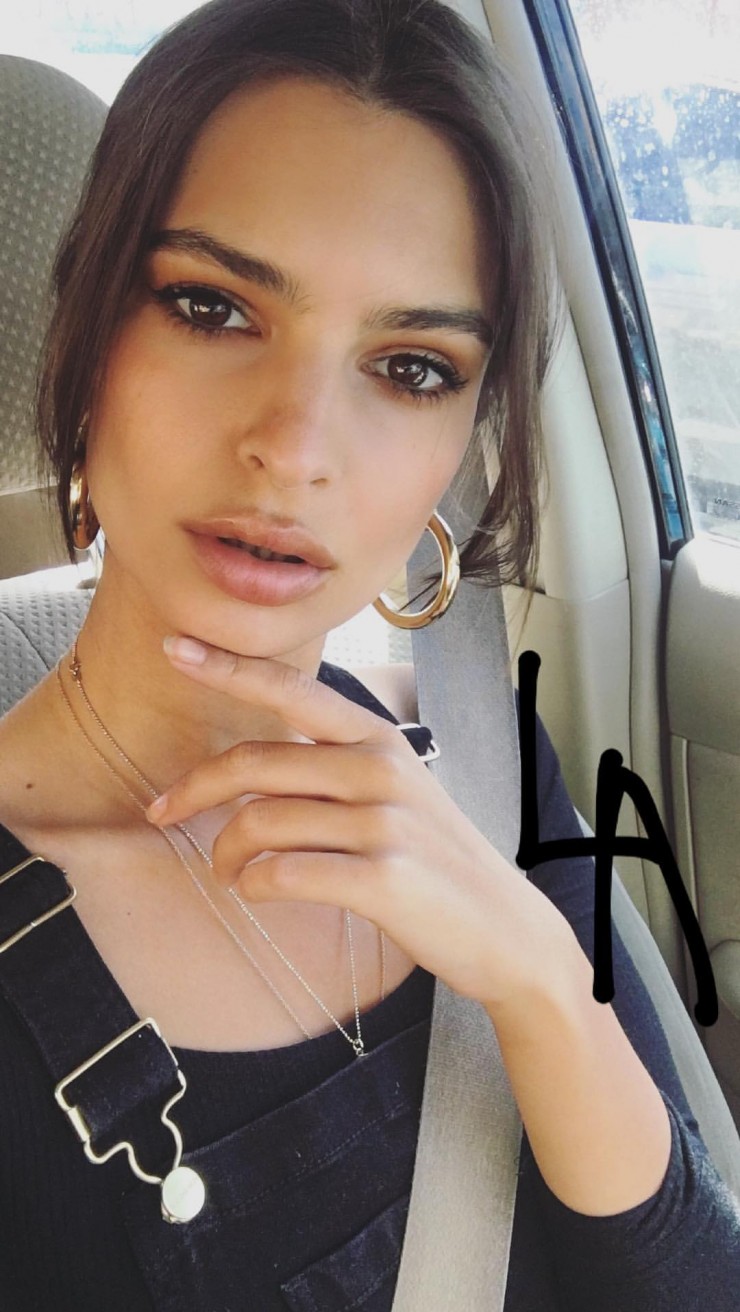 Emily Ratajkowski taking a selfie