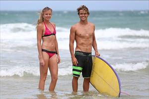Daniela Hantuchova bikini beach surfing candids in Brisbane, Australia, December 26, 2012 