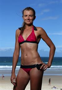 Daniela Hantuchova bikini beach surfing candids in Brisbane, Australia, December 26, 2012 