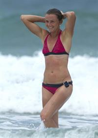 Daniela Hantuchova bikini beach surfing candids in Brisbane, Australia, December 26, 2012 