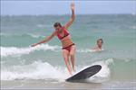 Daniela Hantuchova bikini beach surfing candids in Brisbane, Australia, December 26, 2012 