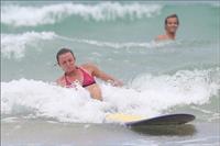 Daniela Hantuchova bikini beach surfing candids in Brisbane, Australia, December 26, 2012 