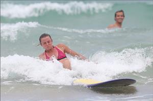 Daniela Hantuchova bikini beach surfing candids in Brisbane, Australia, December 26, 2012 