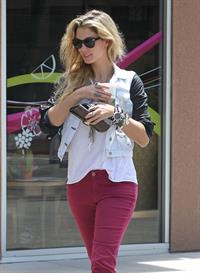 Delta Goodrem - Stopping to get a coffee on her way to work in Los Angeles, California - July 18, 2012