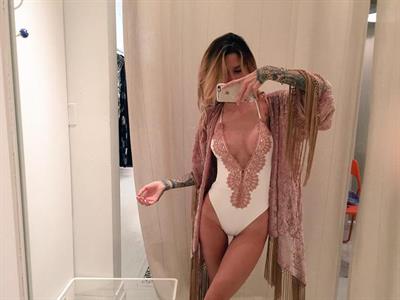 Jenah Yamamoto in a bikini taking a selfie