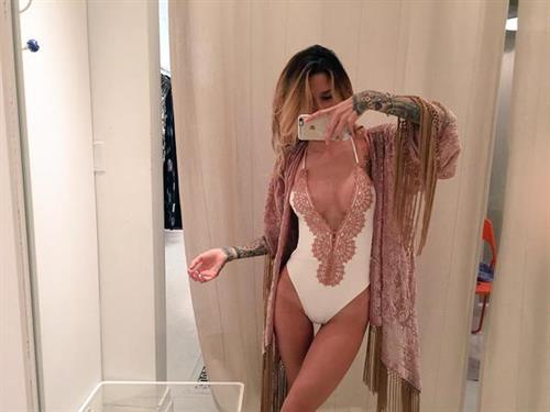 Jenah Yamamoto in a bikini taking a selfie