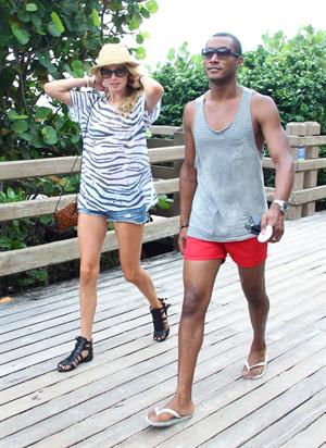 Doutzen Kroes bikini beach pictures in Miami August 16, 2012