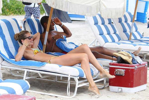 Doutzen Kroes bikini beach pictures in Miami August 16, 2012
