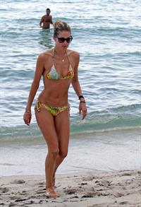 Doutzen Kroes bikini beach pictures in Miami August 16, 2012