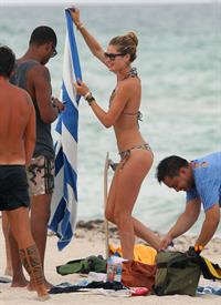 Doutzen Kroes bikini candids on the beach in Miami, Florida Augusts 15, 2012