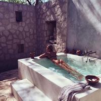 Meredith Mickelson in a bikini - ass