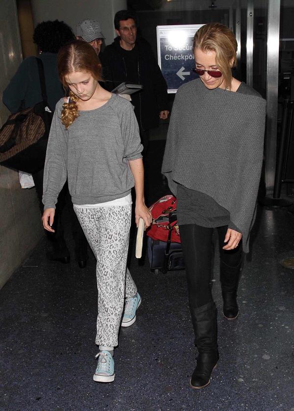 Felicity Huffman Arrives at LAX Airport with daughter in Los Angeles (November 11, 2013) 