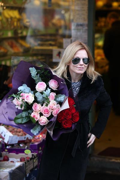 Geri Halliwell shopping for some roses in London on February 14, 2013