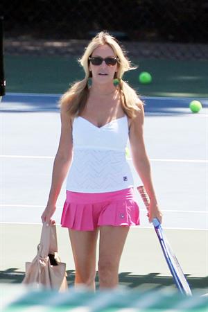Heather Locklear - Playing with a pink dress Tennis in Malibu (Aug 1, 2012)