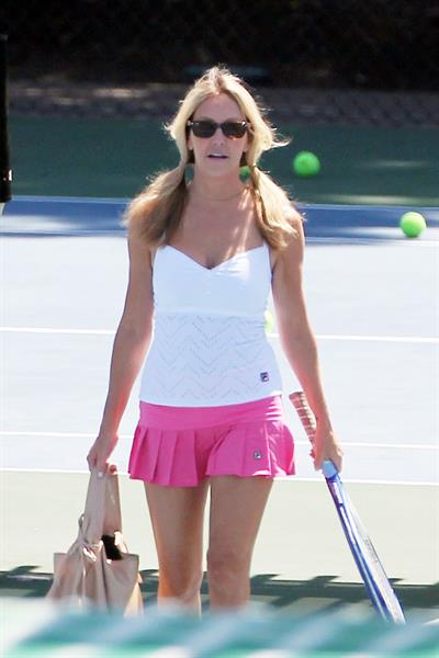 Heather Locklear - Playing with a pink dress Tennis in Malibu (Aug 1, 2012)