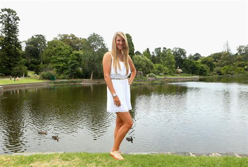 Victoria Azarenka poses with Memorial Cup after winning the 2013 Australian Open January 27, 2013 