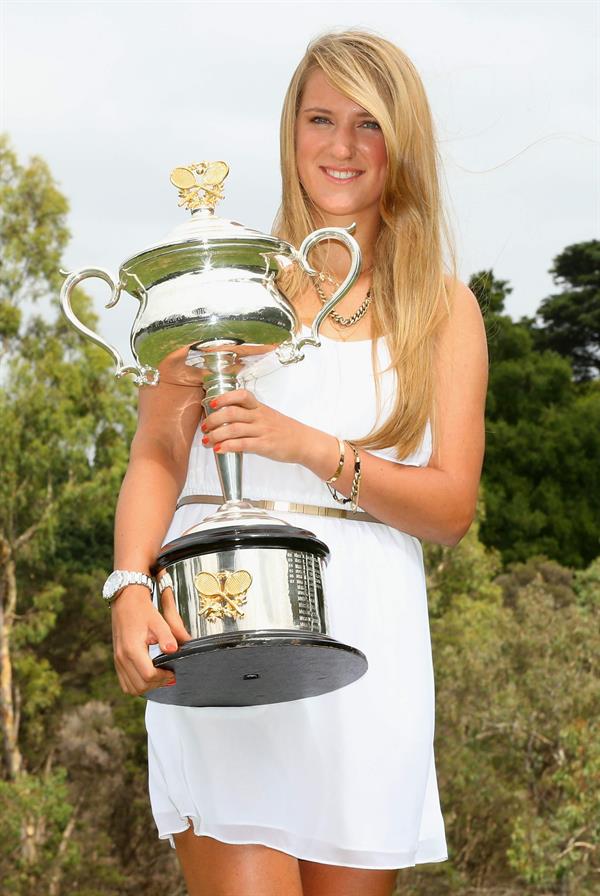 Victoria Azarenka poses with Memorial Cup after winning the 2013 Australian Open January 27, 2013 