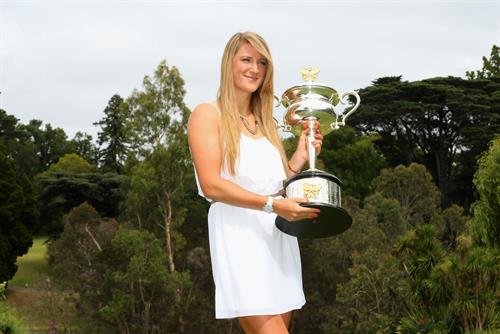 Victoria Azarenka poses with Memorial Cup after winning the 2013 Australian Open January 27, 2013 