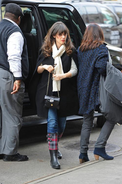 Zooey Deschanel seen out in SoHo holding a Chanel purse. November 16, 2012 