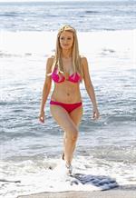Holly Madison - In a pink bikini at Laguna Beach in California Sept 6, 2012