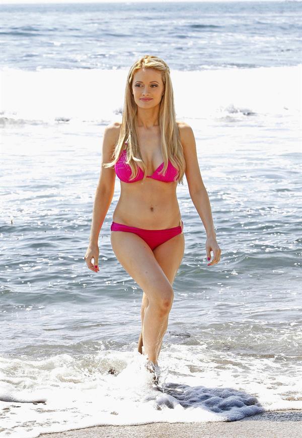 Holly Madison - In a pink bikini at Laguna Beach in California Sept 6, 2012