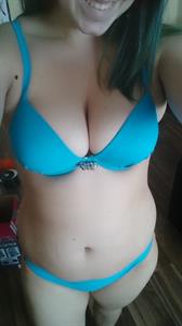 Anonymous in a bikini taking a selfie