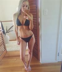 Anonymous in a bikini taking a selfie