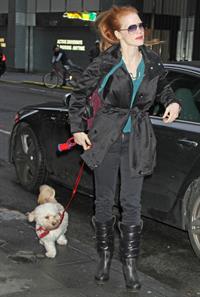 Jessica Chastain with her dog Chaplin arriving to the Walter Kerr Theatre in New York City December 27, 2012 